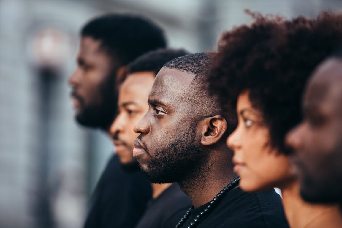 Group of Black Men and Black Woman with Serious Facial Expressio